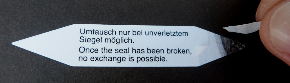 Polystyrol-Siegel - unbemerktes Ablösen ist unmöglich Sicherheits-Siegel aus Polystyrol mit Text Umtausch nur bei unverletztem Siegel möglich
