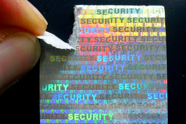 Hologrammetiketten mit Endlostext und Microtext als Siegelaufkleber