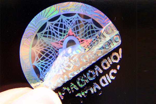 Runde Hologrammetiketten als Originalsiegel mit rückseitigem Void-Zerstör-Effekt