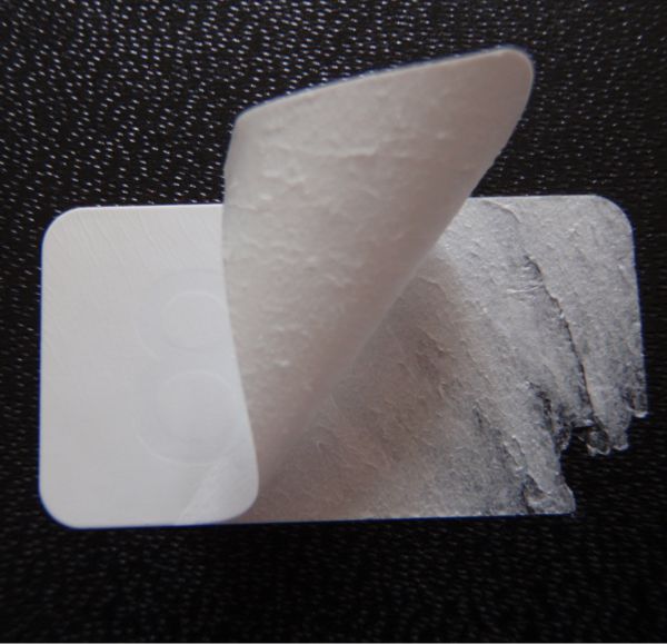 Unbedruckte blanko Sicherheitssiegel aus weißer PE-Security-Folie für Verpackungen und Dokumente