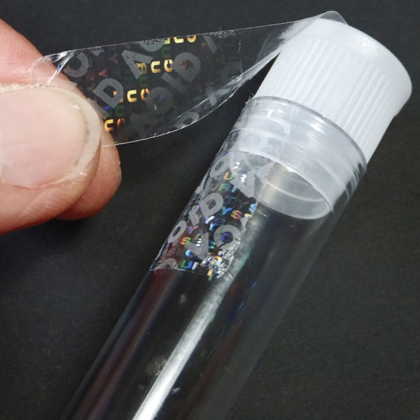 Void-Siegel - übertragungs- und manipulationssicher Beim transparenten Hologramlm-Verschlusssiegel wird bei Ablöseversuchen ein Void-Schriftzug aktiviert