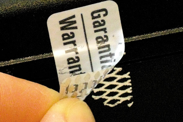 Garantiesiegel - Rautenmuster-Effekt schütz vor unerlaubtem Ablösen Sicherheitsetikett aus silberner Rautenmusterfolie mit Aufdruck Garantiesiegel Warranty Seal