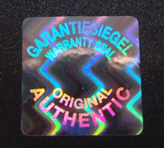 Hologrammetikett als Gewährleistungs- und Echtheits-Siegel Sicherheitsetikett aus Hologrammfolie mit Schriftzügen Garantiesiegel  Warranty Seal Original Authentic