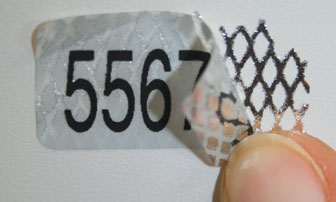 Nummerierte Sicherheits-Etiketten silberner Rautenmusterfolie mit Zerstör-Effekt beim Ablösen